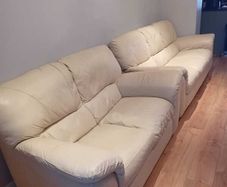 Pair Of Matching White Leather Sofas
