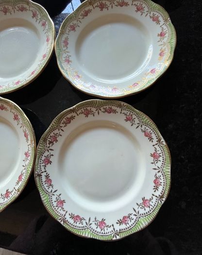 6 Bone China Side Plates & 1 Small side plate