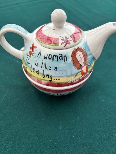 A Ceramic One Cup Teapot.