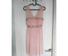 Dress in dusty pink colour Size M