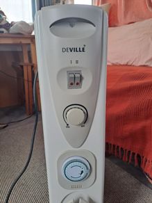 Portable electric radiator heater