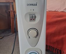 Portable electric radiator heater