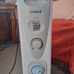Portable electric radiator heater