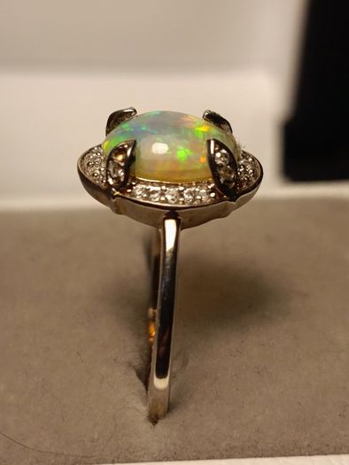 Ethiopian Welo Opal and Lab Grown Diamond Oval Cluster Ring.