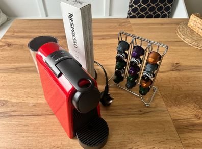 Coffee machine Nespresso + Capsules holder + Capsules + Descaling sachet