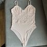 2 Bodysuits, size 10-12 Image 2