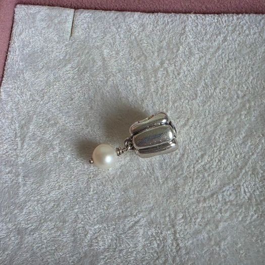 Pandora  charm with pearl drop and purple gemstone in great condition