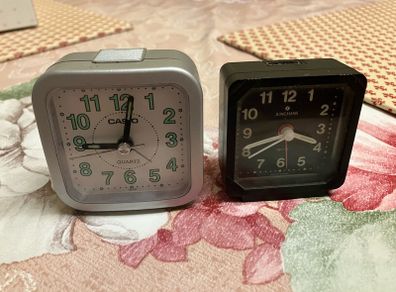 Casio TQ 141 & Junghans 710 travel alarm clocks