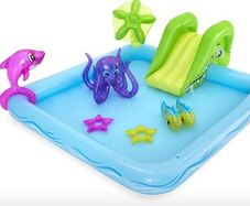 l large inflatable paddling pool , slide and sprinkler palm tree