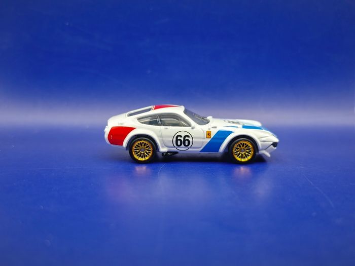 Hot Wheels Ferrari 365 GTB4 C with custom wheels.