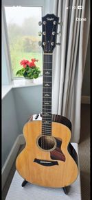 Taylor 618e  Grand Orchestra Spruce with Flamed Maple.