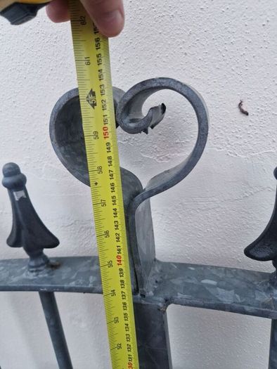Decorative galvanised double steel gates.