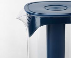 Water jug with removable refreeze-able ice pack.