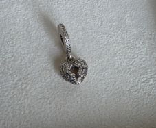 Pandora locket angel wings,with enamel dangle charm very good condition