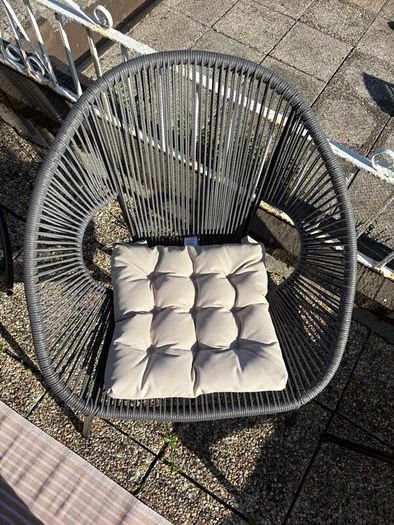 Pair of woven garden chairs