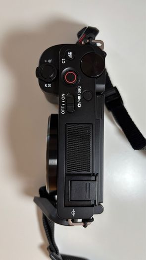 Sony ZVE-10 + Sony E 18-105mm f/4 lens (cage and 5 batteries)