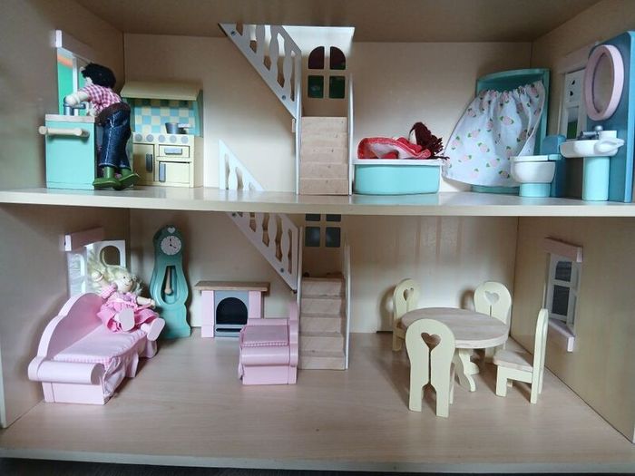 Doll house, furniture and dolls