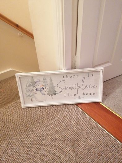 Snowplace like home sign