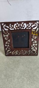 Cast iron photo frame with a rust finish, rustic style decoration. Dimensions: 15x15 cm. Photo dimensions: 7x7 cm.
