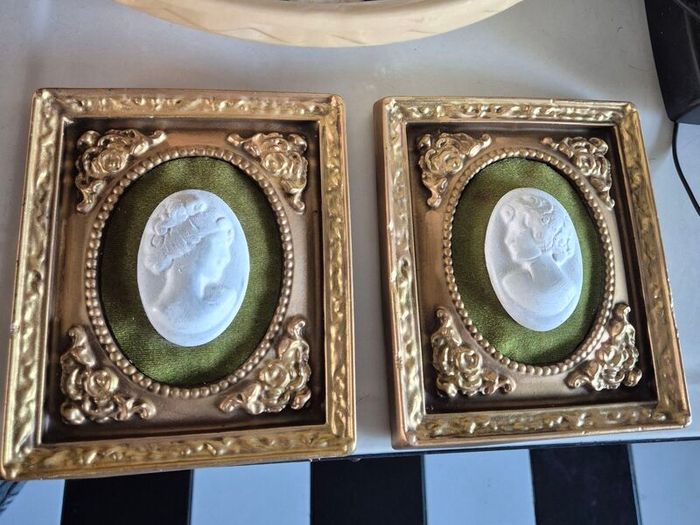 A pair of MidCentury Kelgin wall hanging Plaster  Vintage decorative pair of wall plaques featuring plaster cameos on green velvet background with ornate gold relief plaster frames