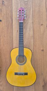 Startone CG-851 3/4 size acoustic guitar with bag and tuner.