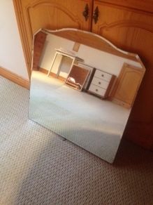 Mirror on timber backing