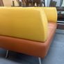 Yellow and orange couch Image 2