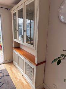 Radiator cover and display unit
