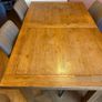 Solid oak dining table and chairs Image 3