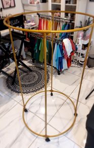 Rotatable circular clothes rack, hanger, rail, display. Gold