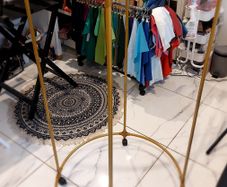 Rotatable circular clothes rack, hanger, rail, display. Gold