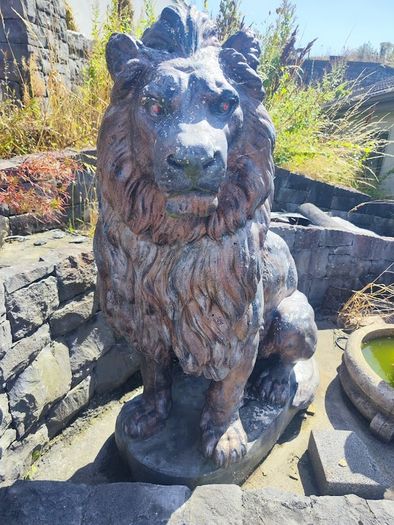Large Stone Sitting Lions Pair