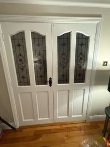 Antique white deal double doors with stained glass