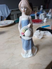 Cellini  Collection  Posing  With Her Hat.  (Unboxed).