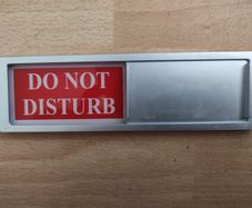 Door sign Do not disturb and Welcome please knock