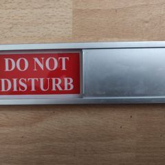 Door sign Do not disturb and Welcome please knock