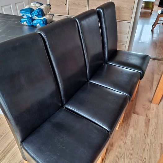 4 Black leather style kitchen chairs. Very few scuff marks 80