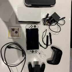 Nintendo Switch Oled include 4 Games,  Pro Controller