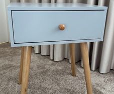 1 Drawer Wooden Nightstand with Round Tapered Legs, Blue and Brown