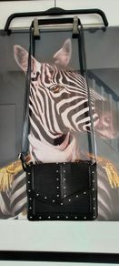 Handbag with studs.
