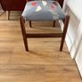 Mid Century Style Wooden Footstool / Ottoman with retro atomic-inspired upholstered seat. Image 4