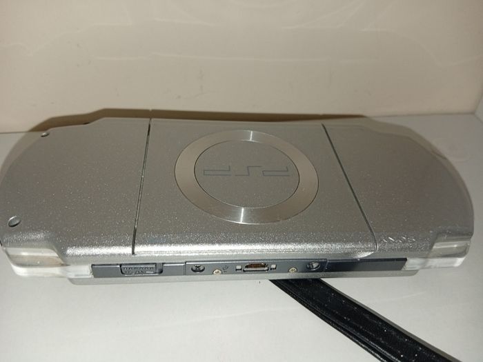 Sony Silver PSP 2003 Console - Works with Digital Games but wont load UMD Disks 16gb sd inc