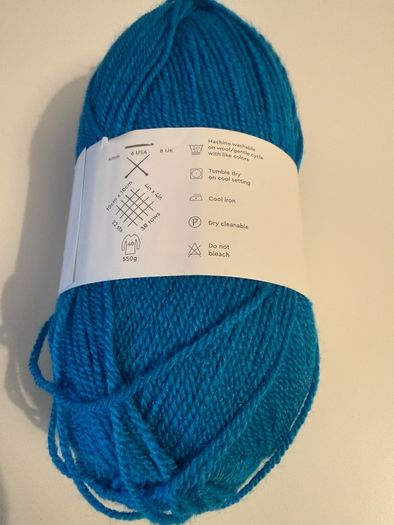 6 balls of blue yarn wool