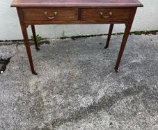 Maghoney wine leather desk with 2 drawers. Inlaid