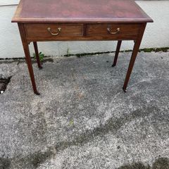 Maghoney wine leather desk with 2 drawers. Inlaid