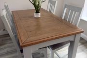 Extendable dinning table and chairs