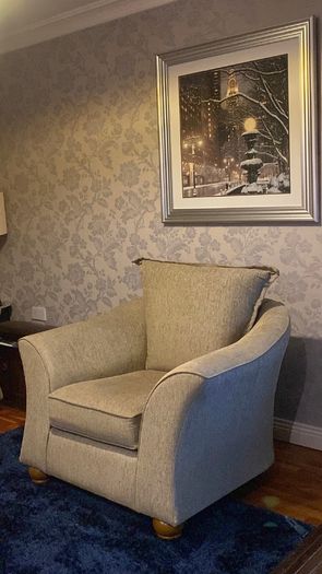 Newly recovered 4 seated  sofa with two chairs