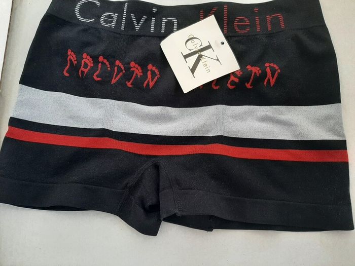 Calvin Klein tag attached