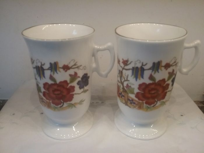 Two Royal Stuart Footed Cups