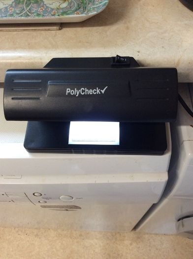Polycheck Bank Note Checker. 9 Watts Ultra Violet Bank Note Checker.